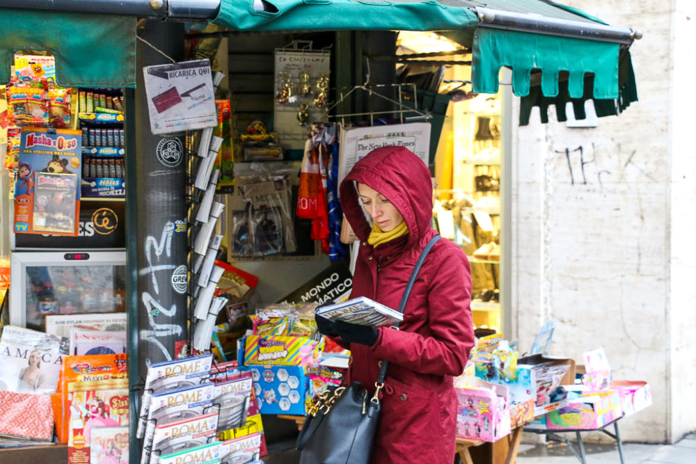 Checking out bookstands in Rome - Roads and Destinations